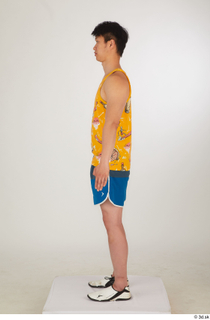  Lan blue shorts dressed sports standing white sneakers whole body yellow printed tank top 0003.jpg